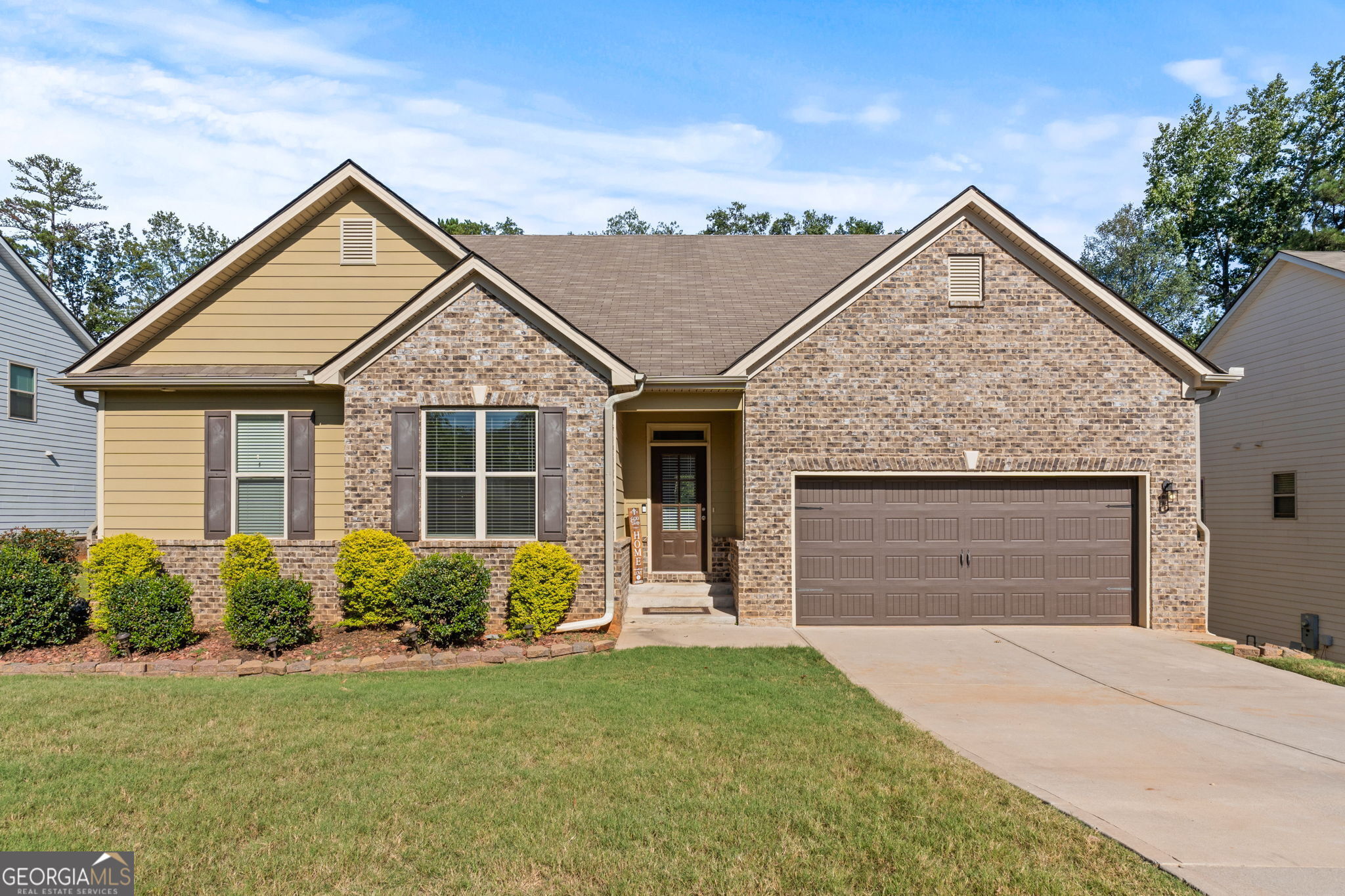 front view of a house with yard