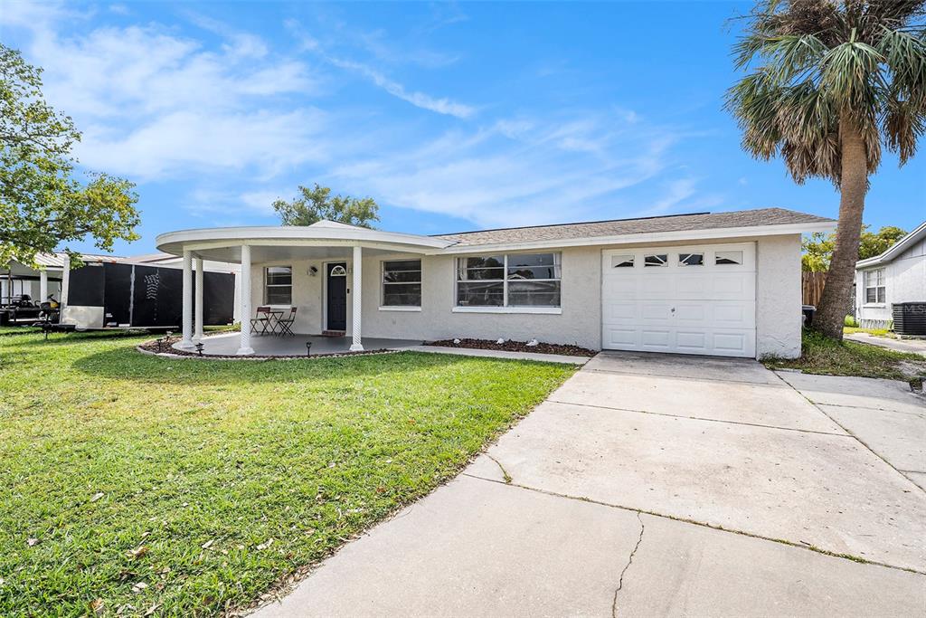 front view of a house with a yard