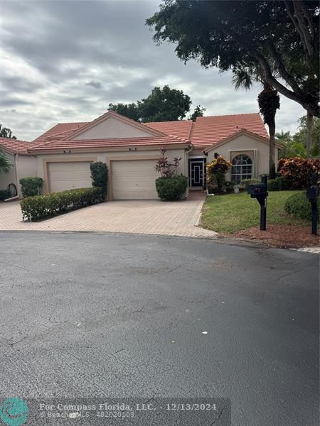 a view of house with outdoor space and street view