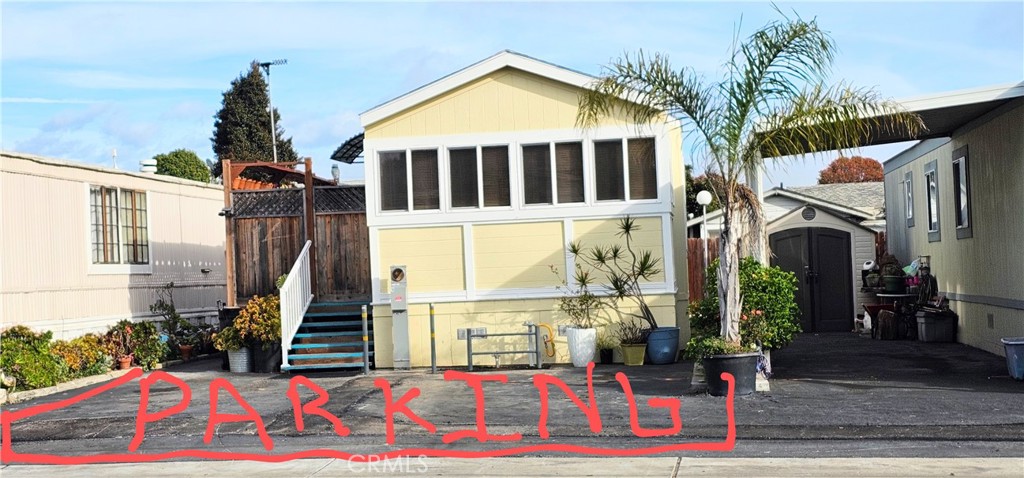 a front view of a house with street