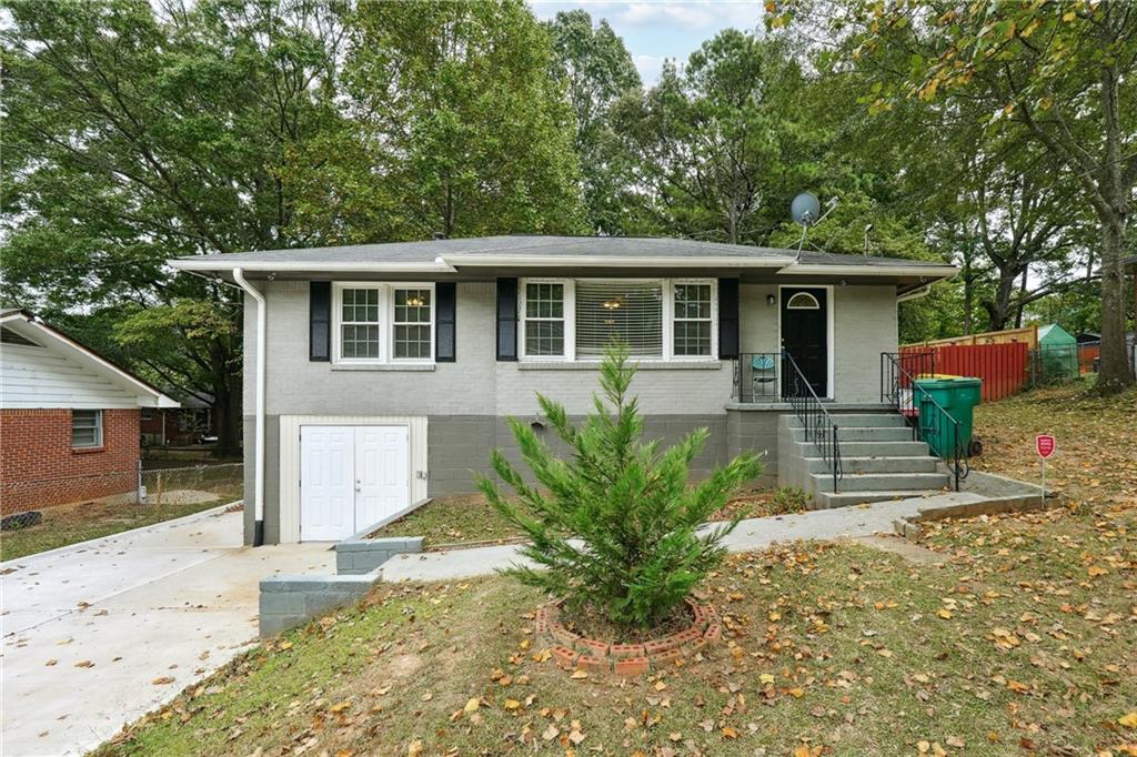 front view of a house with a yard