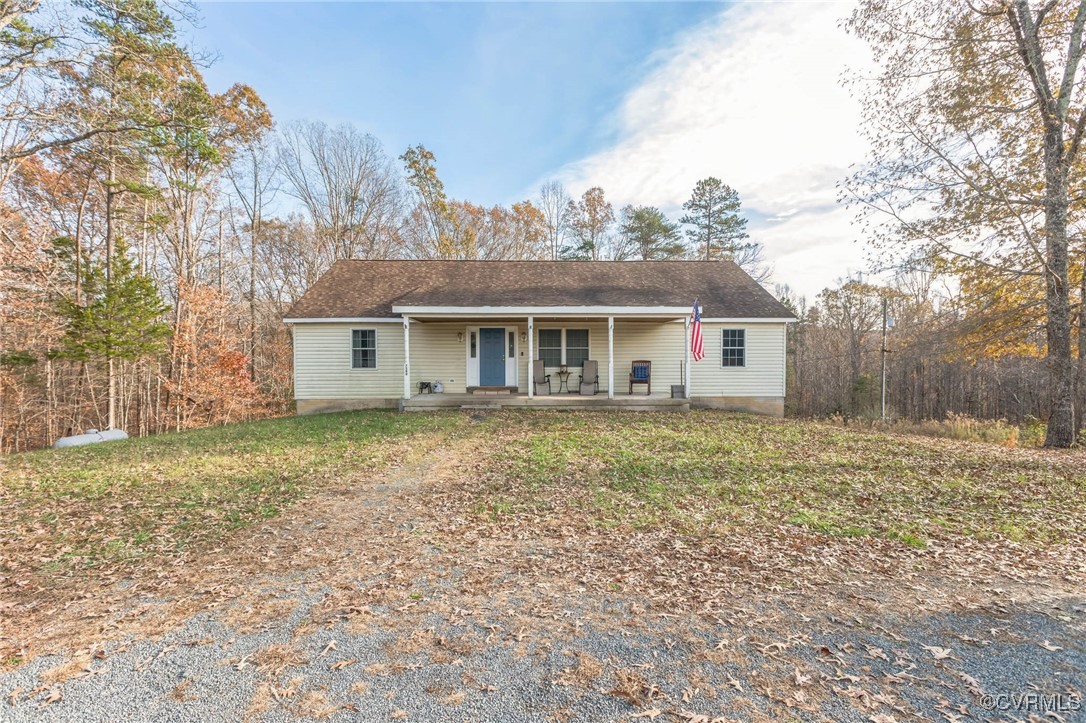 View of front of house with covered porch