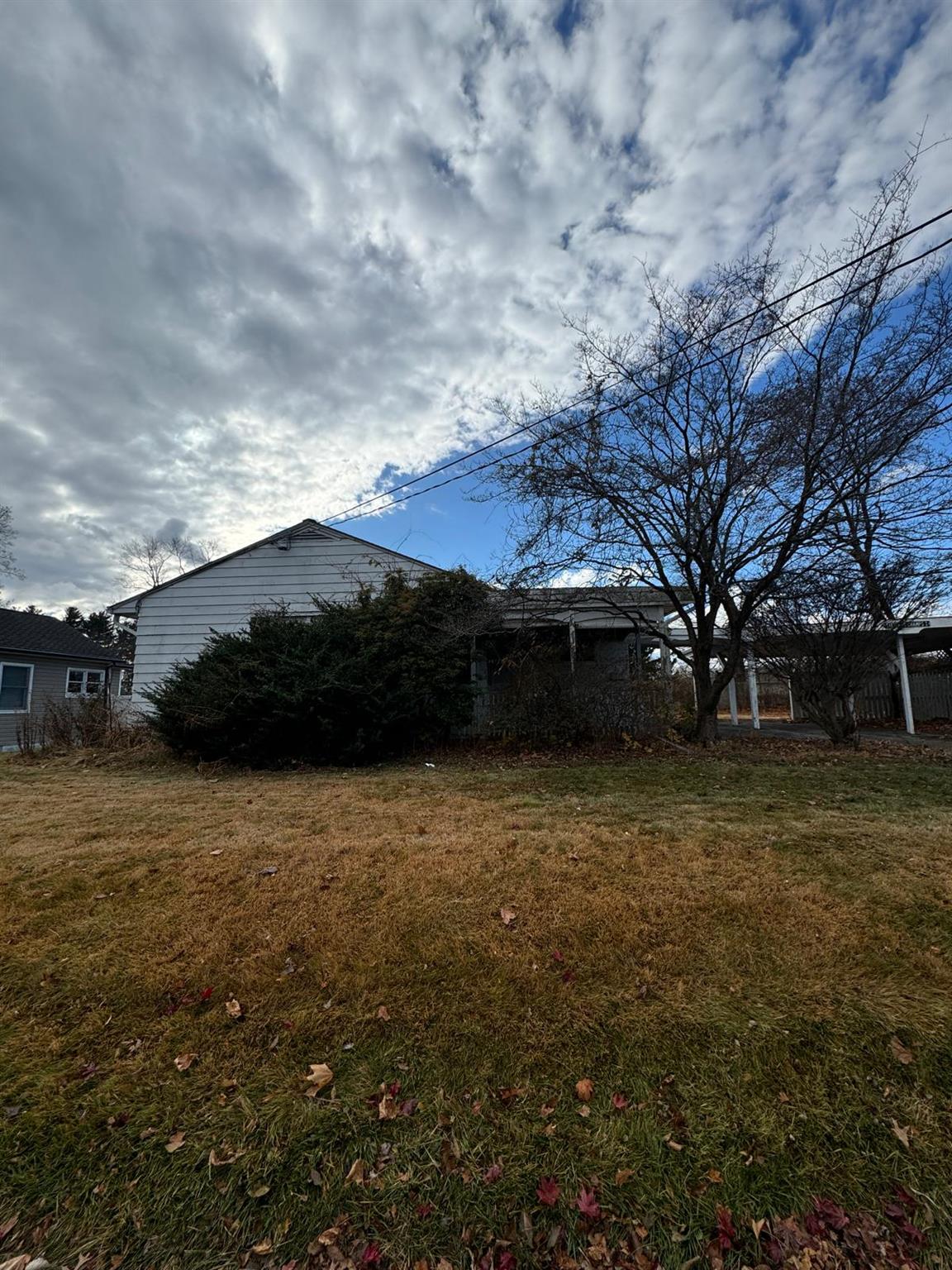 View of home's exterior featuring a yard