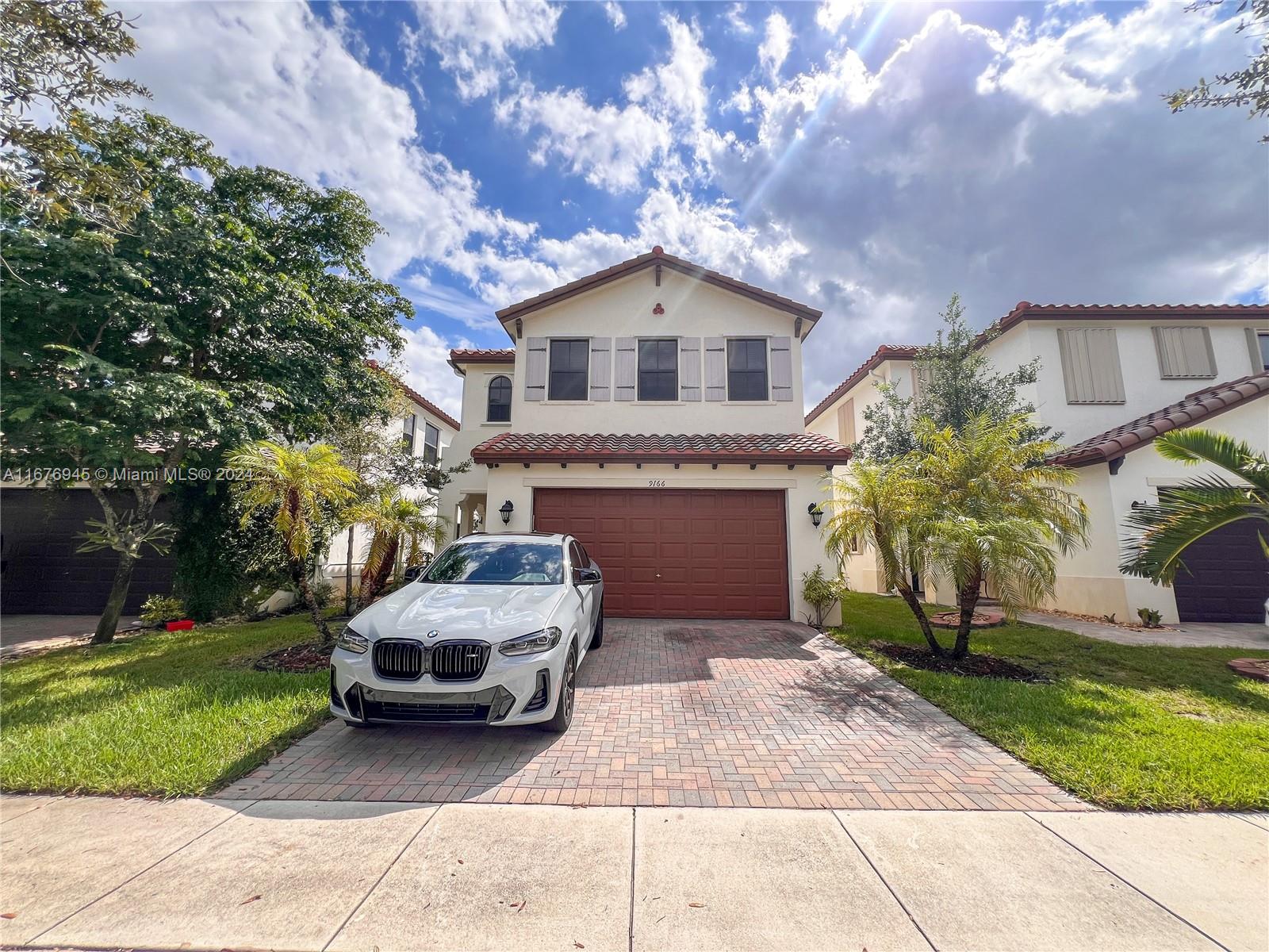 a car parked in front of house