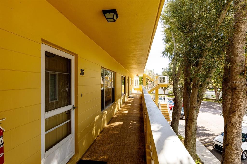 a narrow alley leading to a building