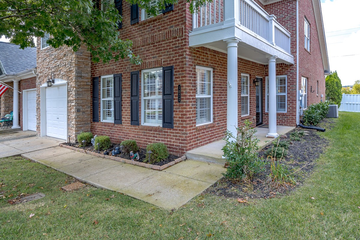 All Brick Townhome with covered entrance.