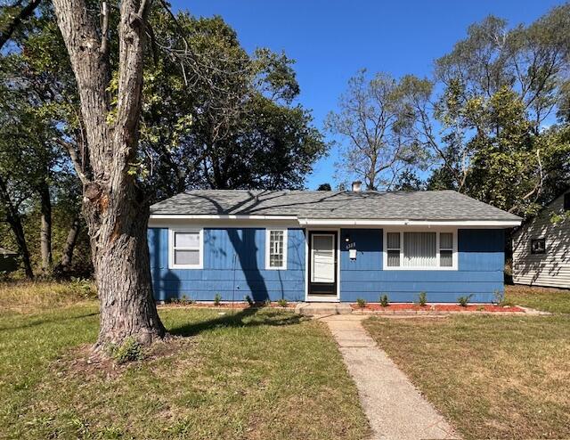 front view of a house with a yard