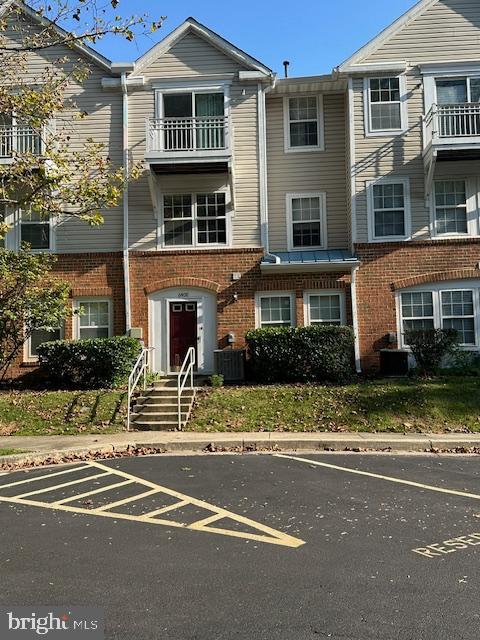 a view of a building with a street