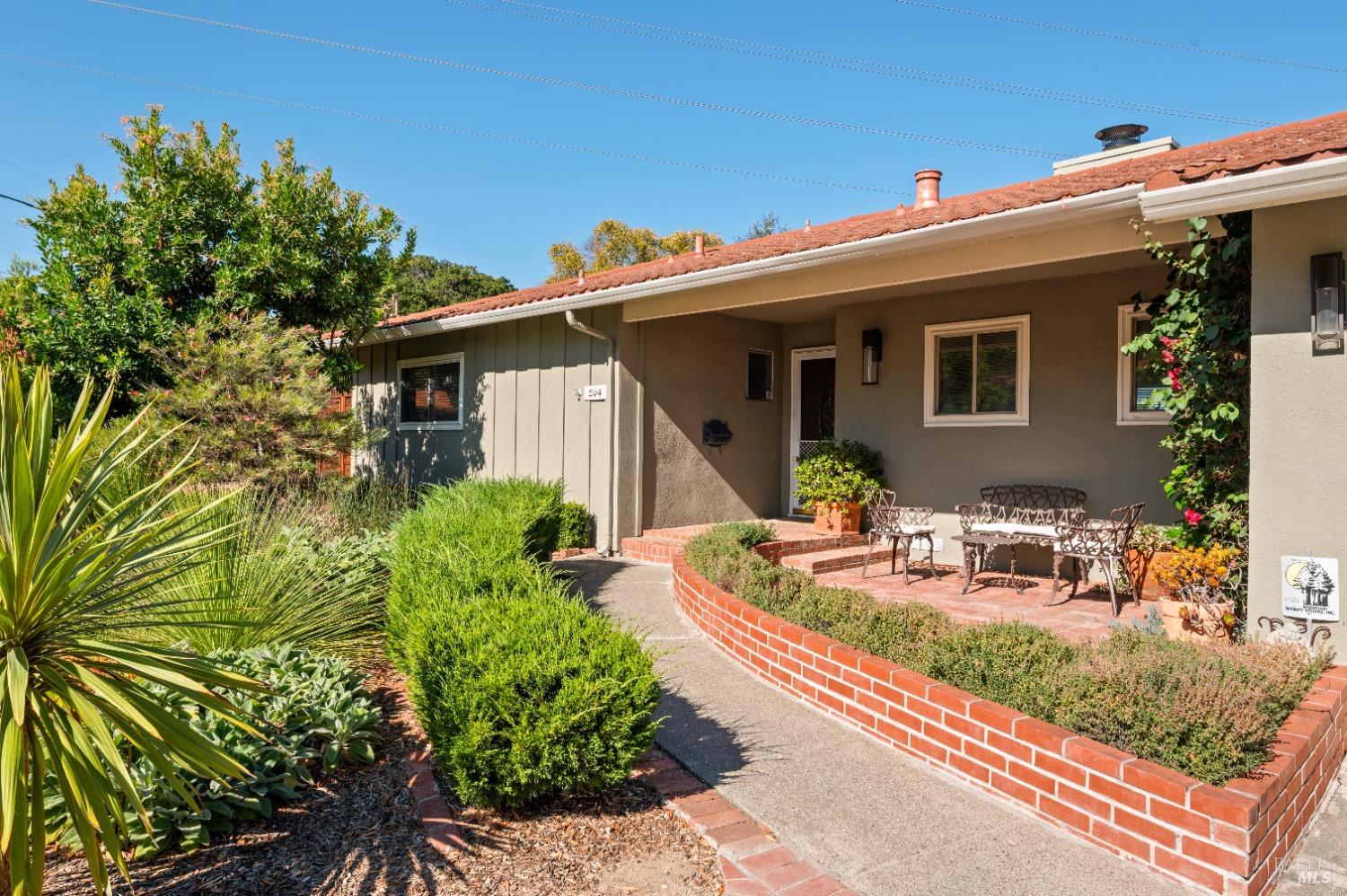 a view of a house with a patio