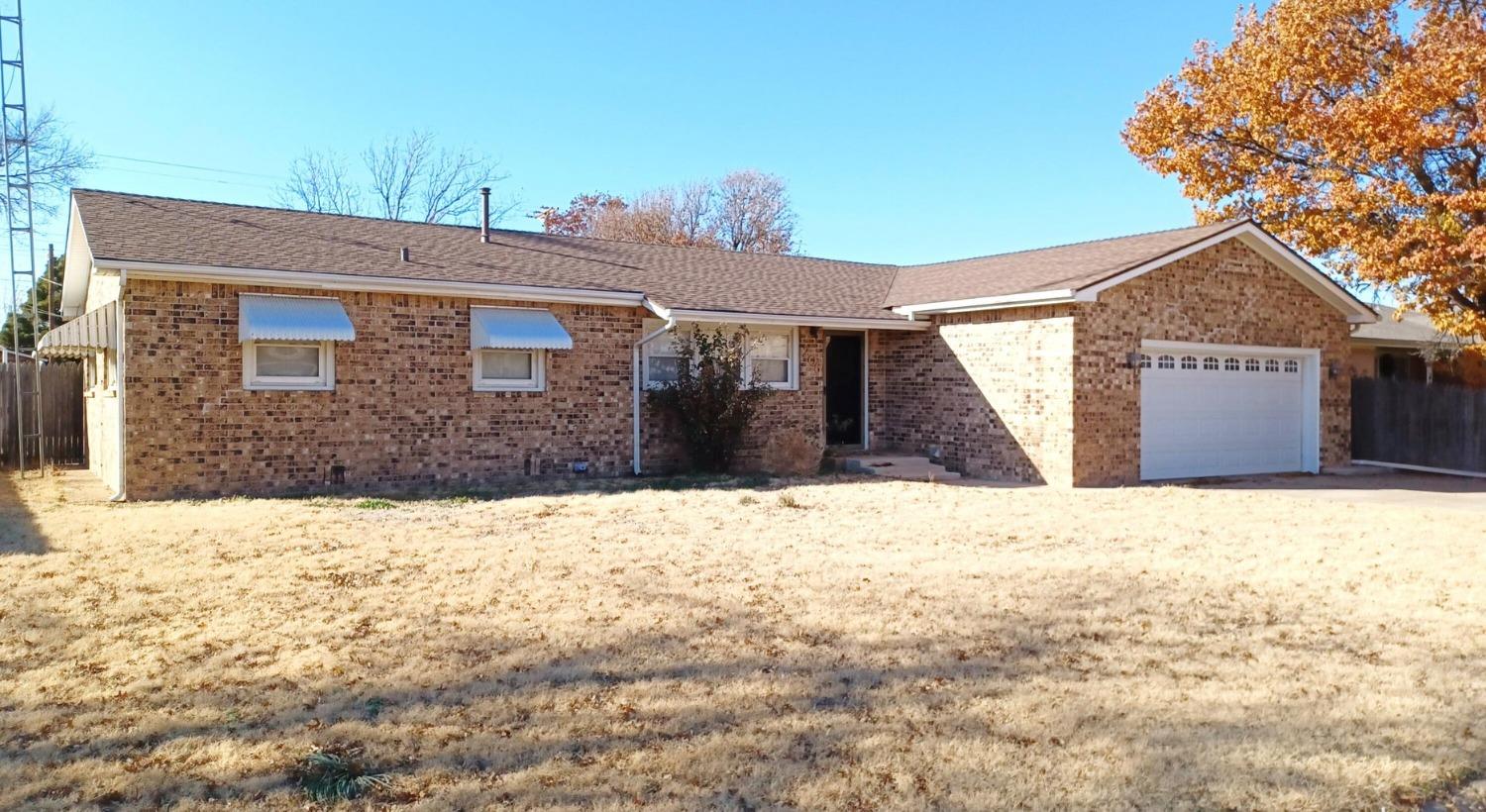 a front view of house with yard