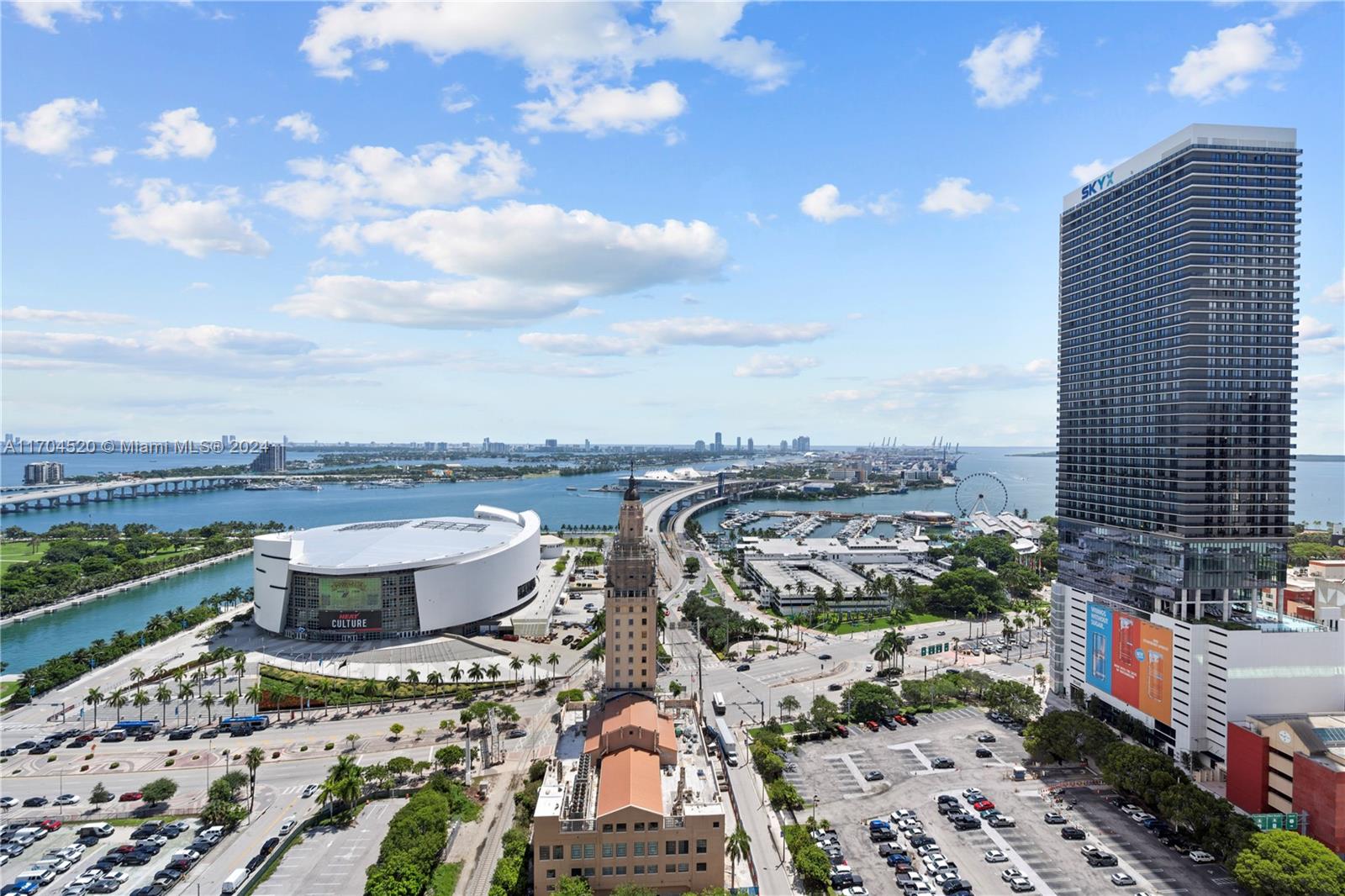 a view of city with ocean