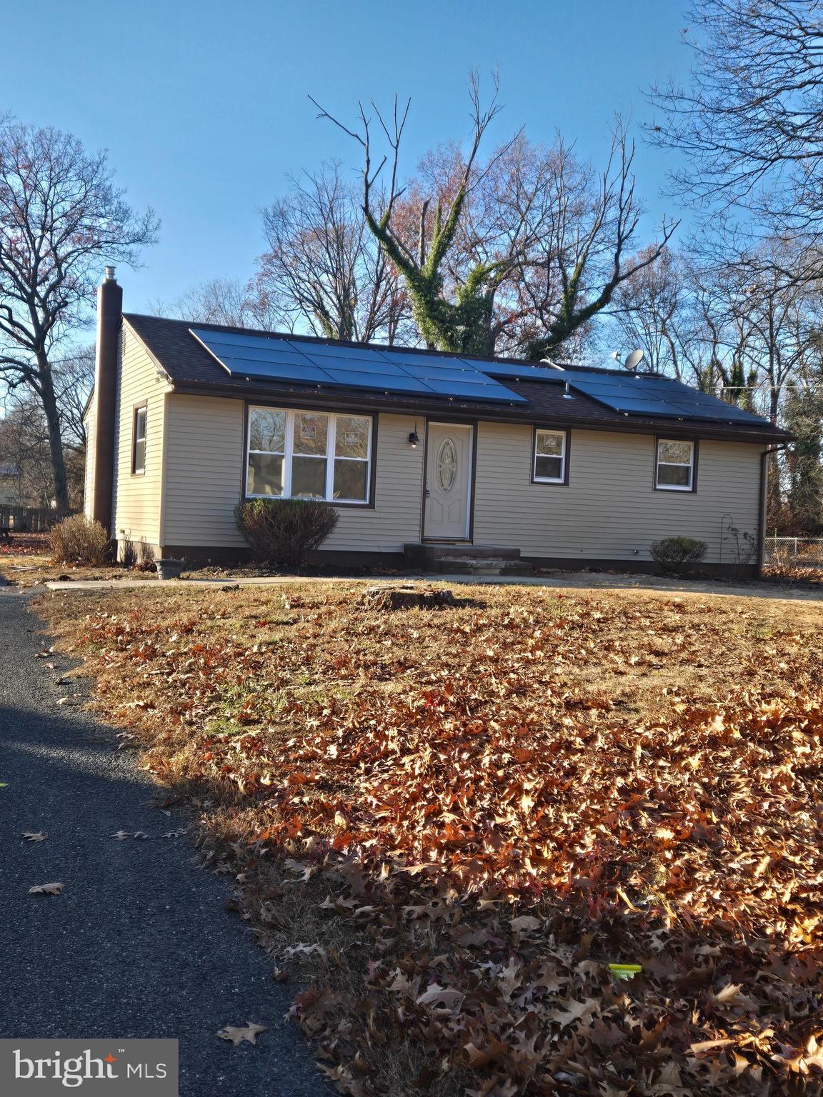 a front view of house with yard