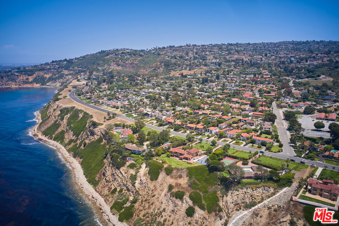 an aerial view of a house with a outdoor space