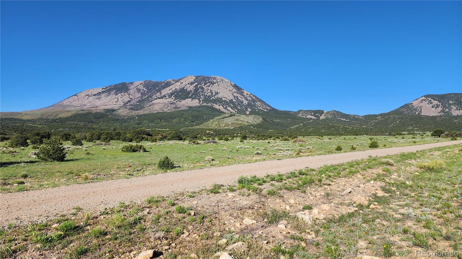 a view of mountain with ocean view