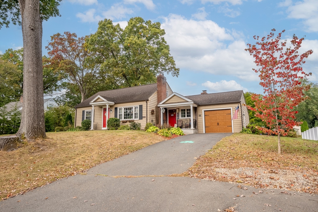 front view of a house with a yard