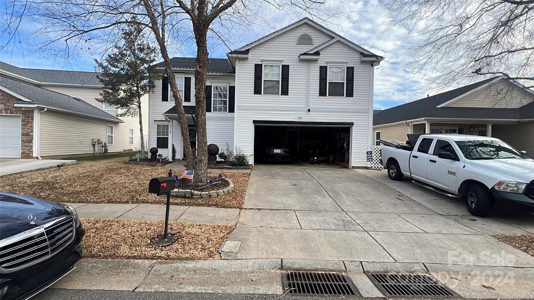 a view of a house with a street