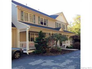 View of front of house with covered porch