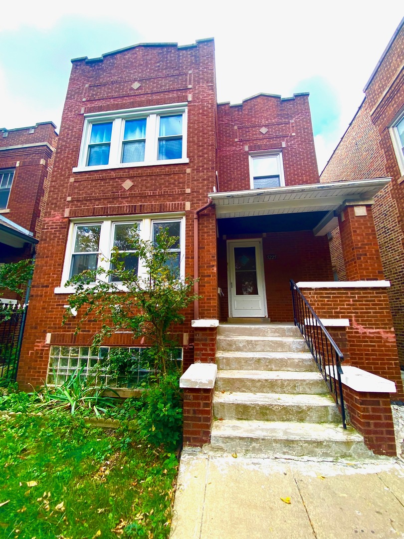 a front view of a multi story residential apartment building