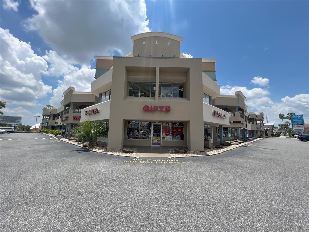 a view of a building with a street