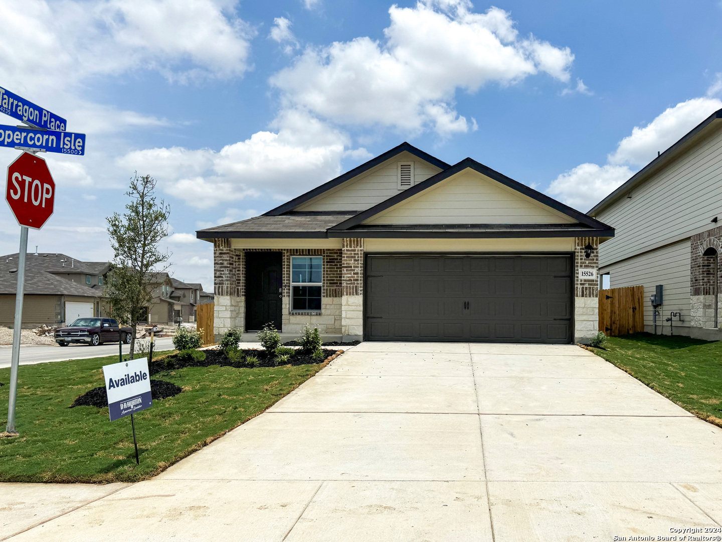 a house with yard in front of it