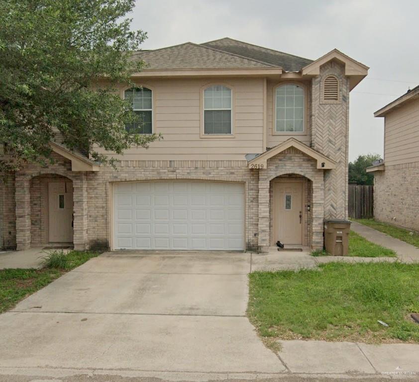 View of front of home with a garage