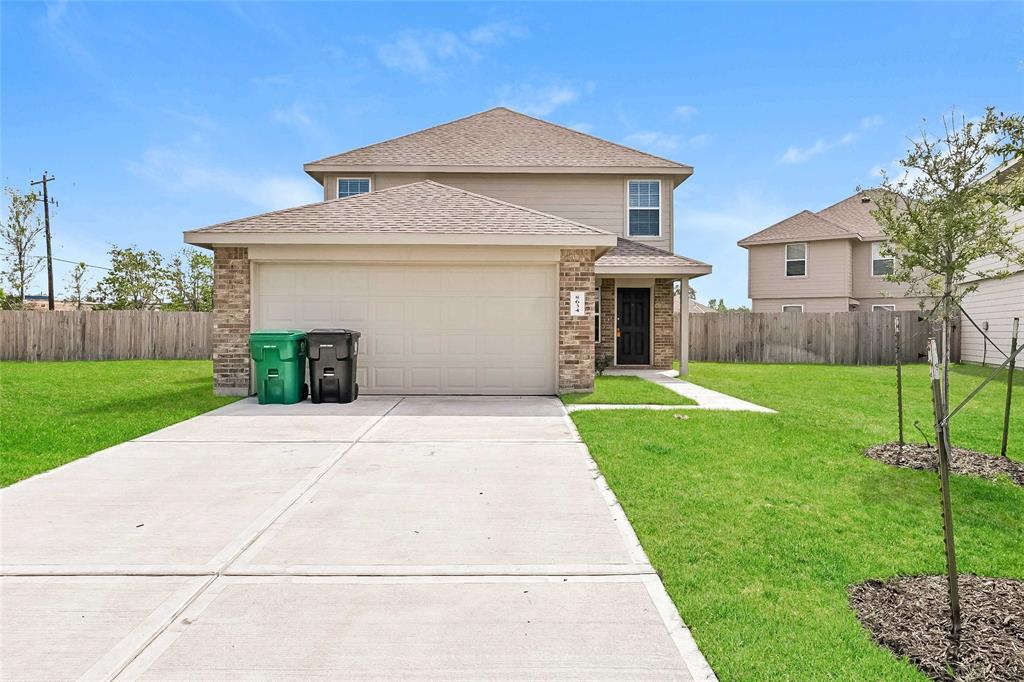 a front view of house with yard