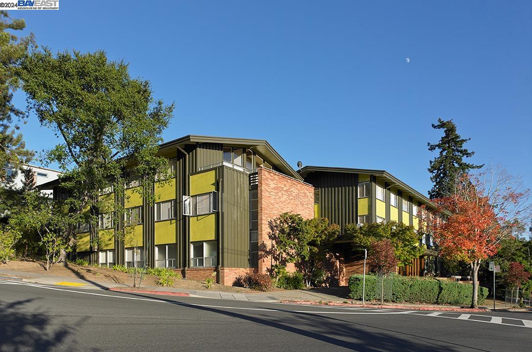 a view of a building with a street