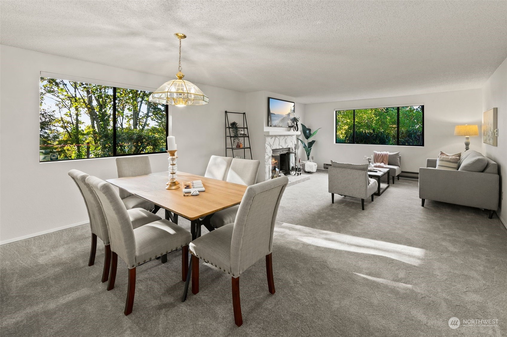 a view of a dining room with furniture window and outside view