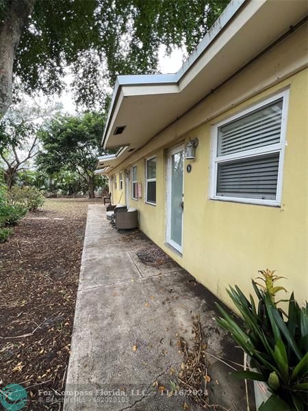 a view of a back yard of the house