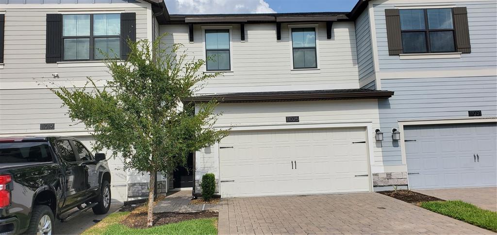 a view of a house with a garage