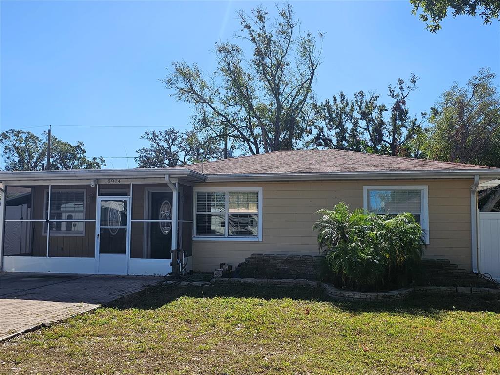 front view of a house with a yard