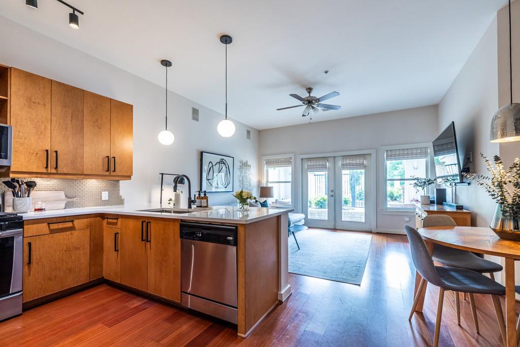 a view of a kitchen and dining room