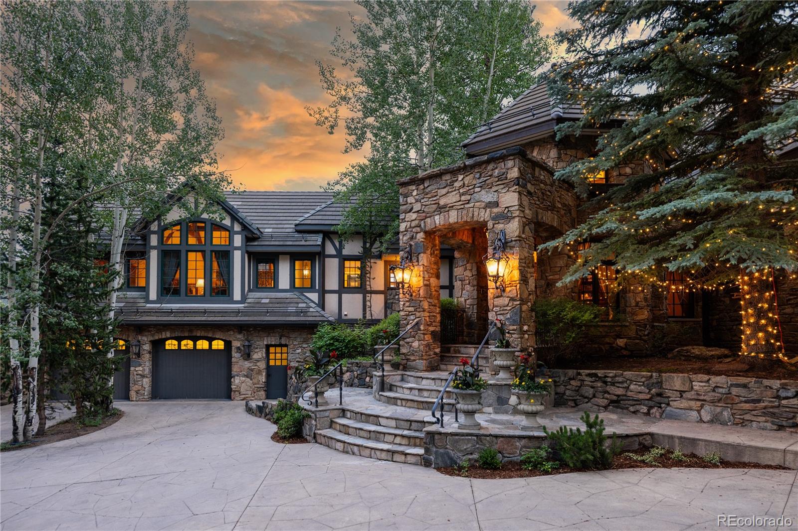 a view of house with outdoor space and sitting area