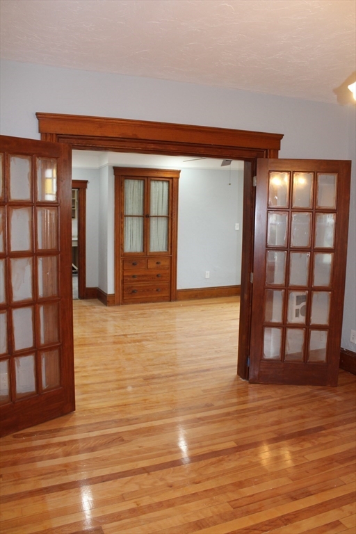 a view of livingroom with wooden floor