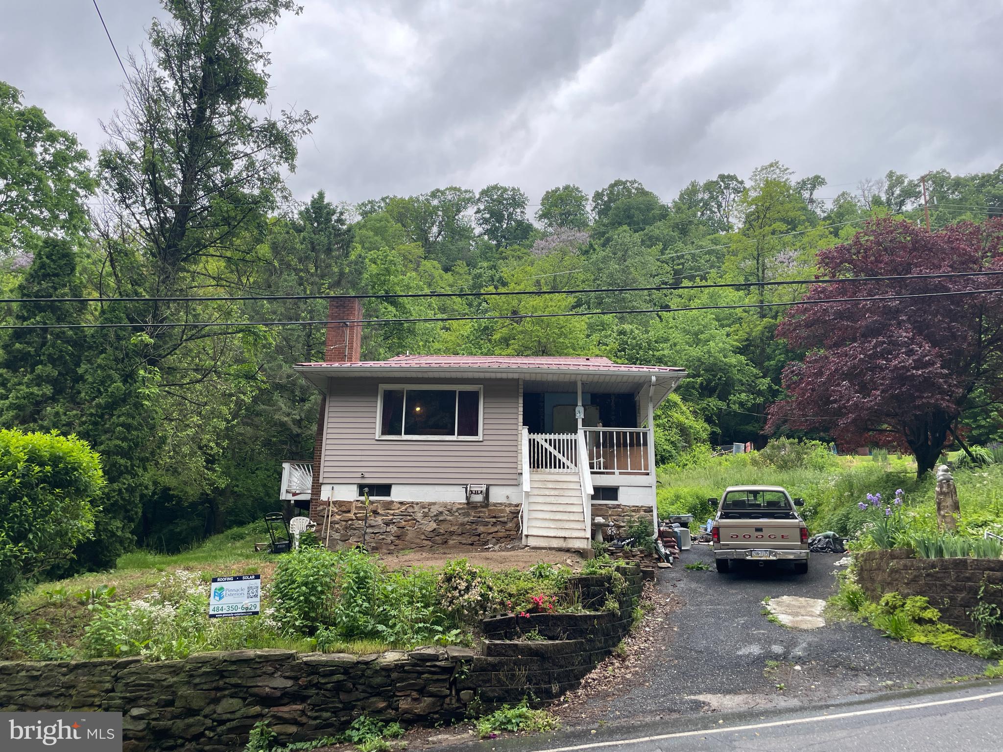 a house view with a garden space