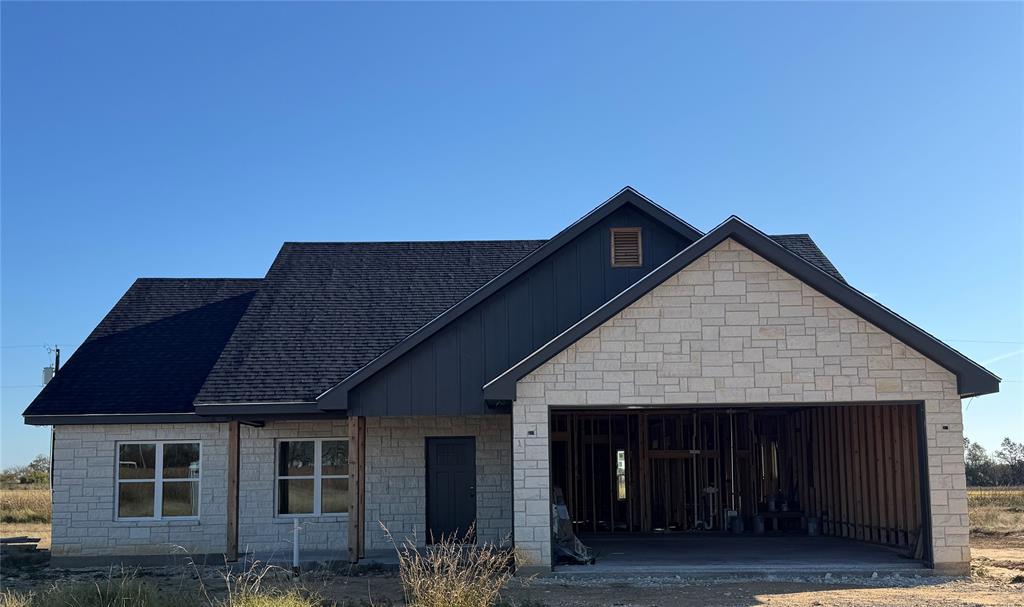 a front view of a house with yard