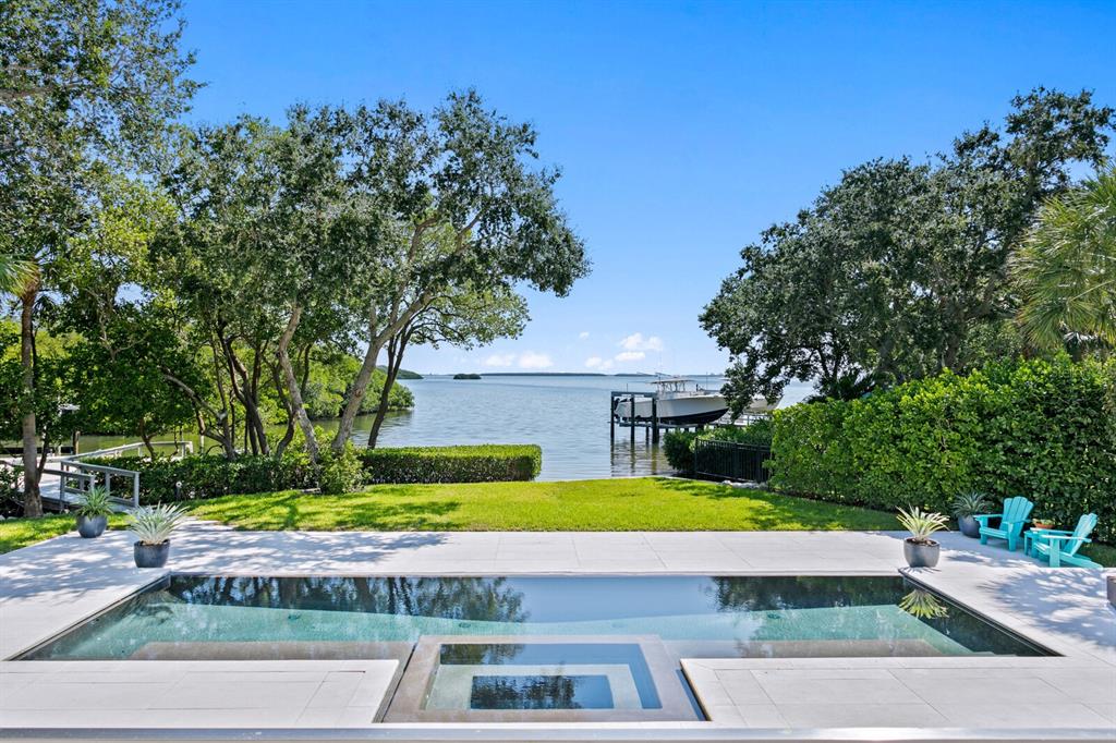 a view of yard and swimming pool