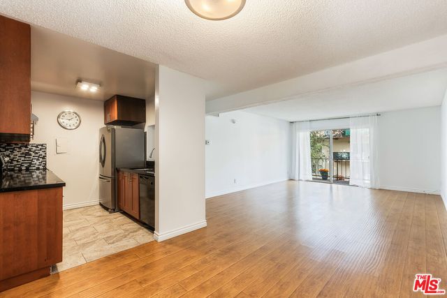 $295,000 | 5460 White Oak Avenue, Unit A211 | Encino