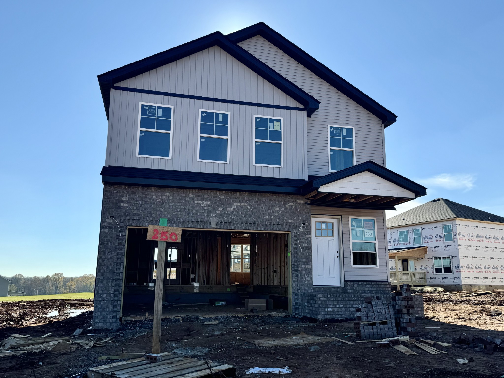 a front view of a house with yard