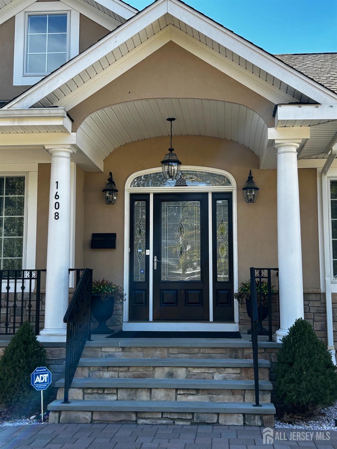 a front view of a house with a front door