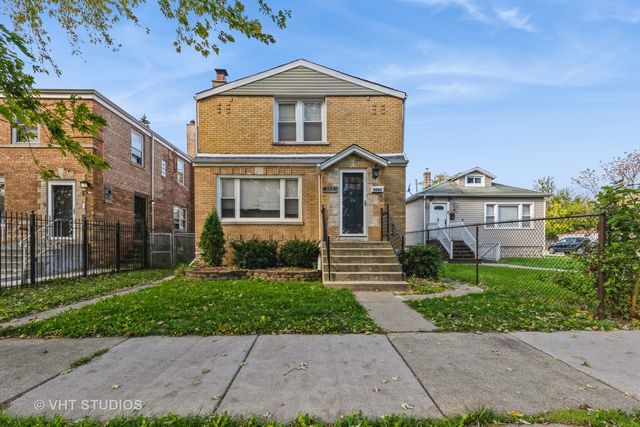 $299,000 | 9204 South Perry Avenue | Roseland