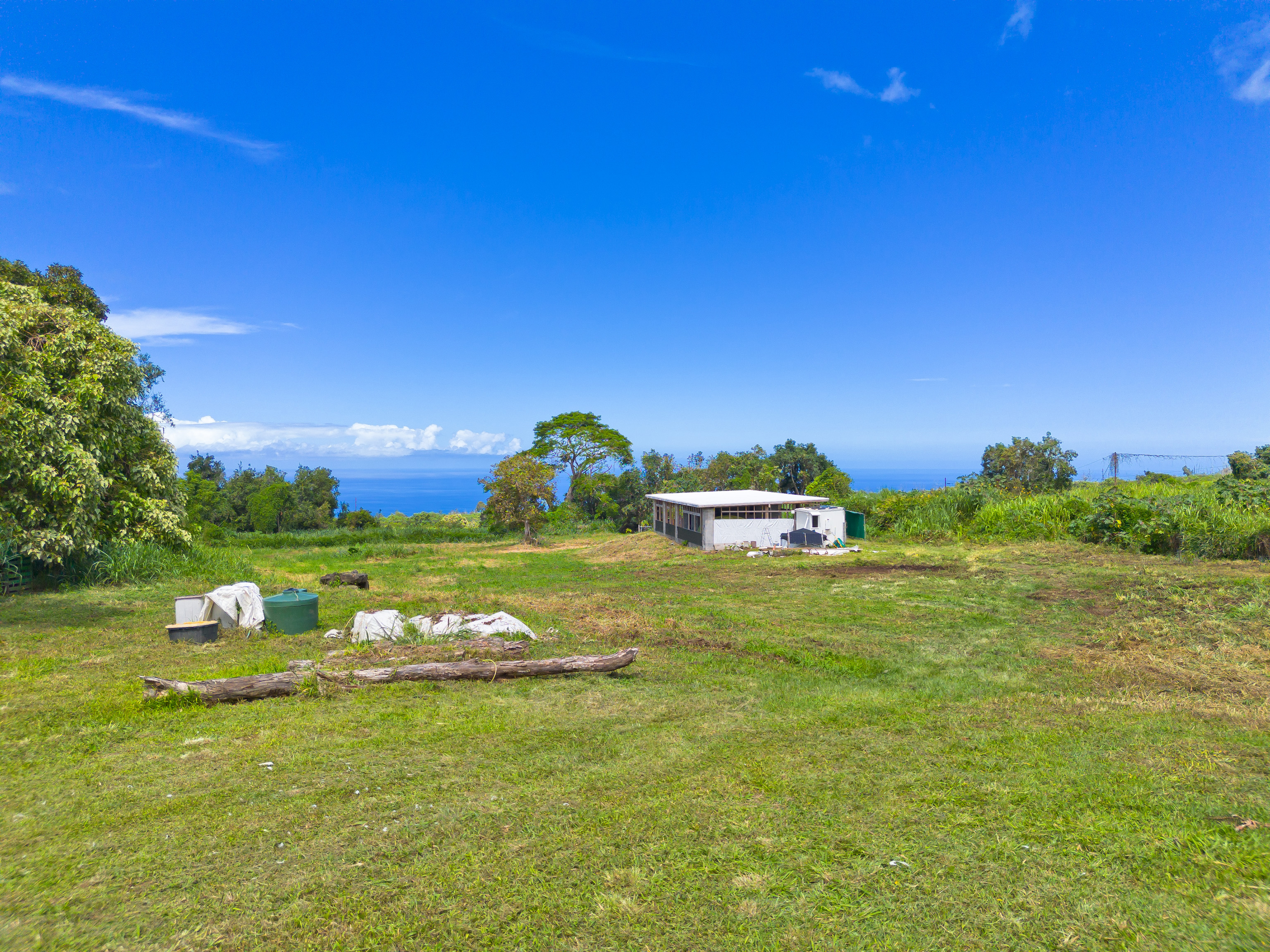 a aerial view of a house with a yard