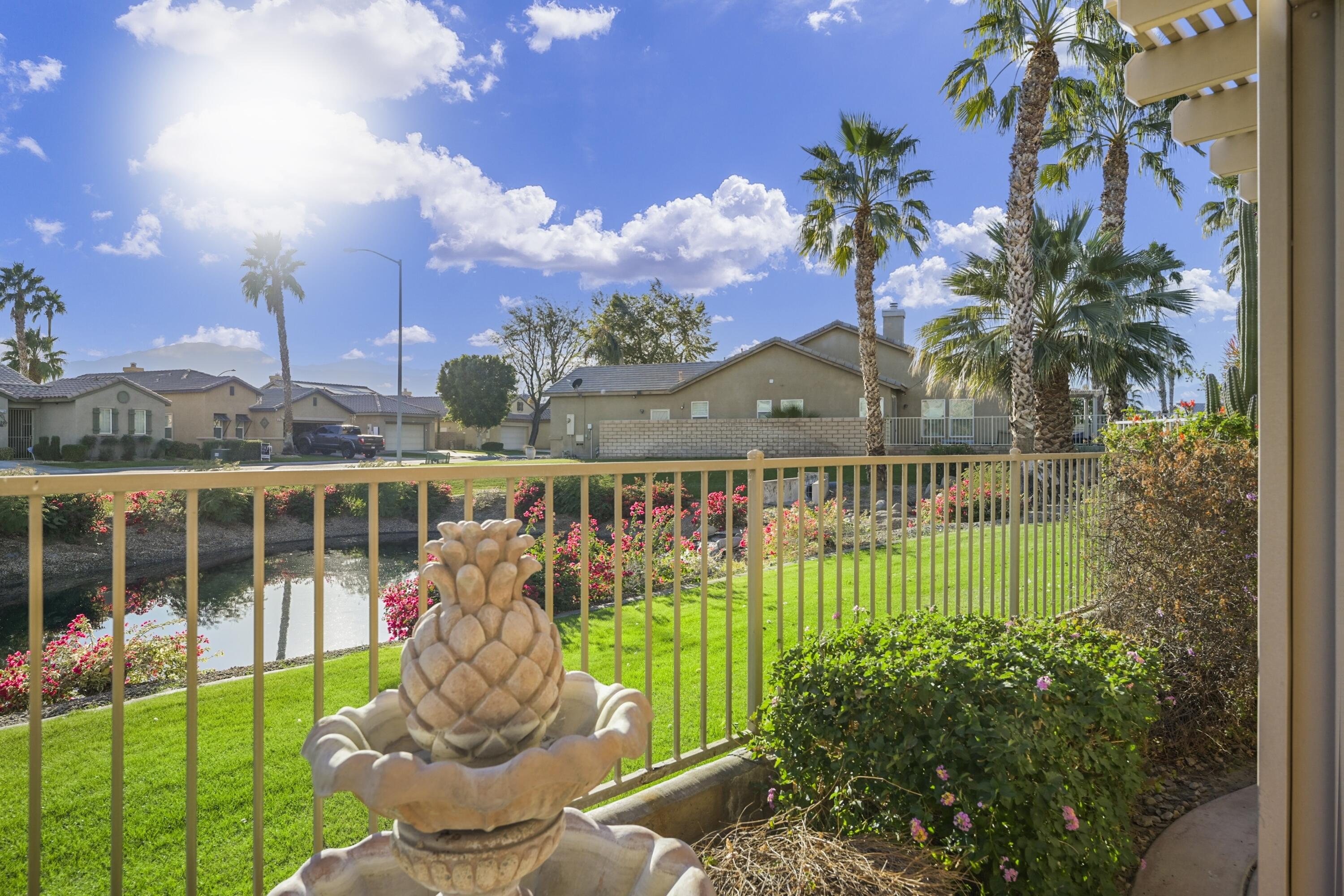 a view of a houses with a park