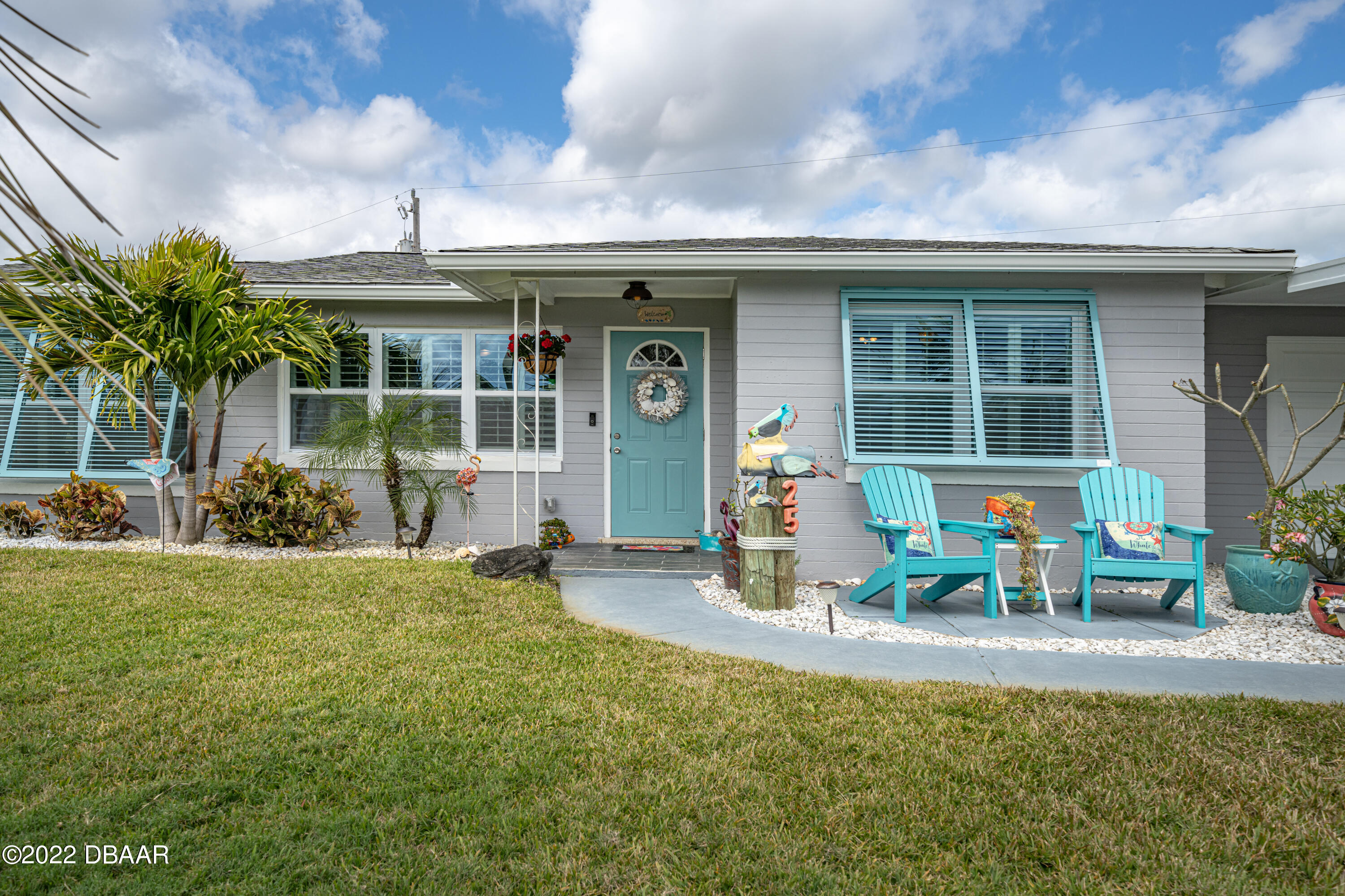 a front view of a house with patio