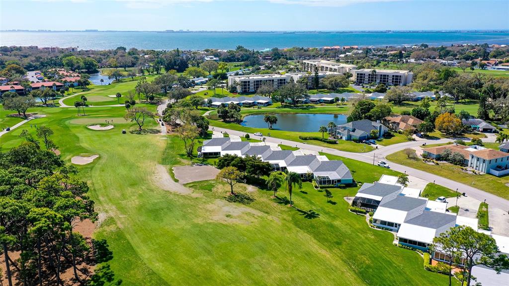 Expansive View of IMG Golf Course's Fairways &Just a Golf Cart Ride to the Waterfront Clubhouse/Restaurant