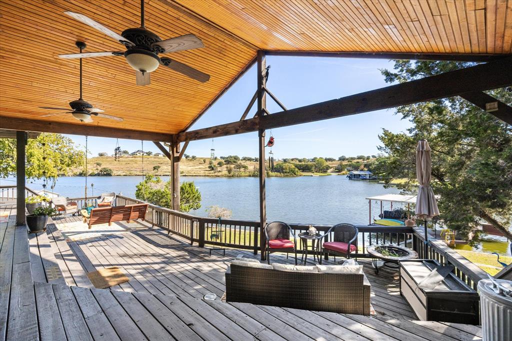 a view of a balcony with wooden floor