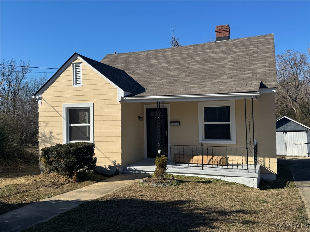 View of front facade featuring covered porch