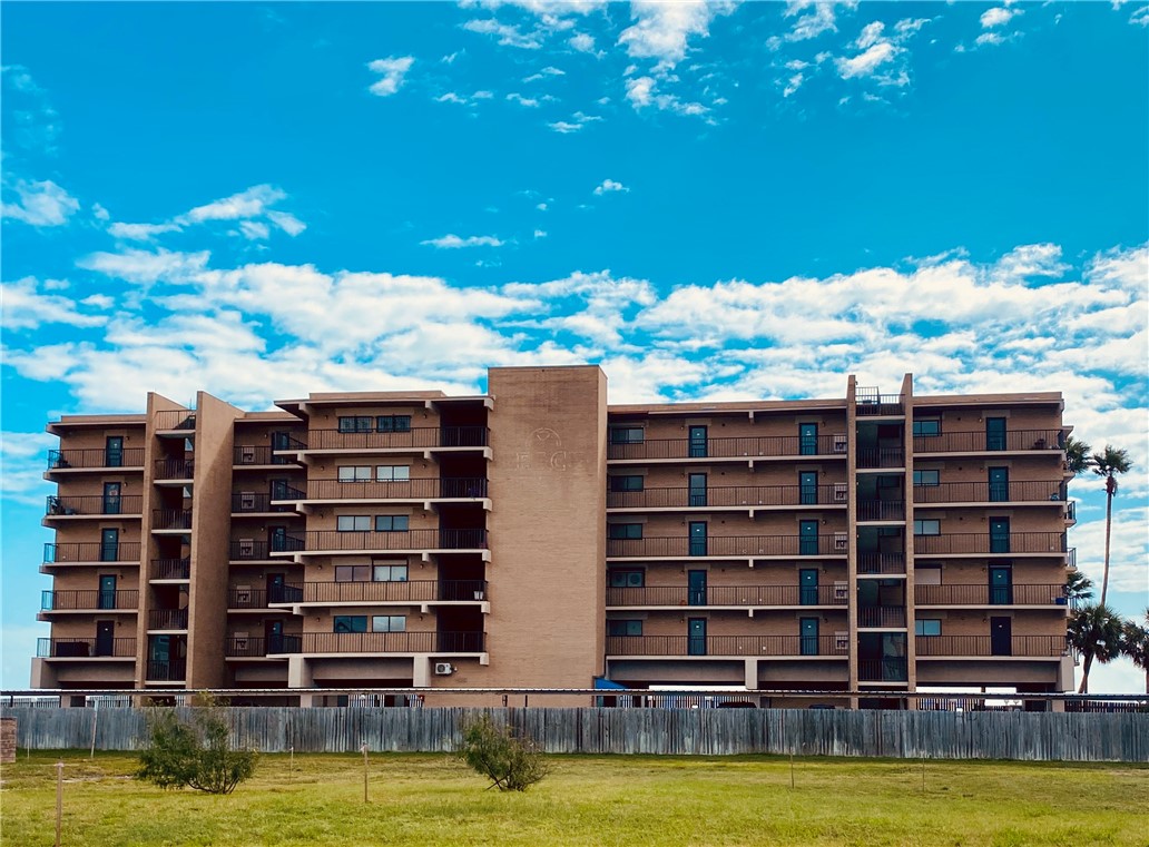 a view of pool with building exterior