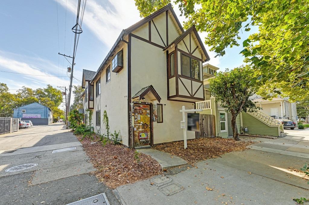 a view of a house with a street