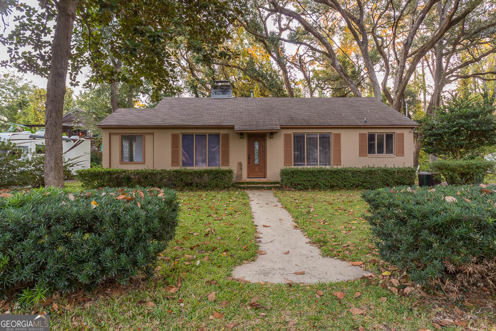 front view of house with a yard